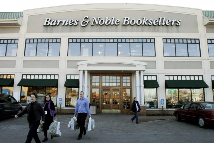 Shoppers leave the Barnes and Noble store on Monday, Nov. 29, 2010 in South Burlington, Vt. Barnes & Noble Inc. said Tuesday, Nov. 30, its fiscal second-quarter loss narrowed, but its results missed expectations as the company continued to invest in its Nook electronic reader and electronic bookstore.(AP Photo/Toby Talbot)