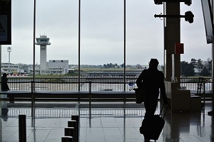 traveller leaving airport