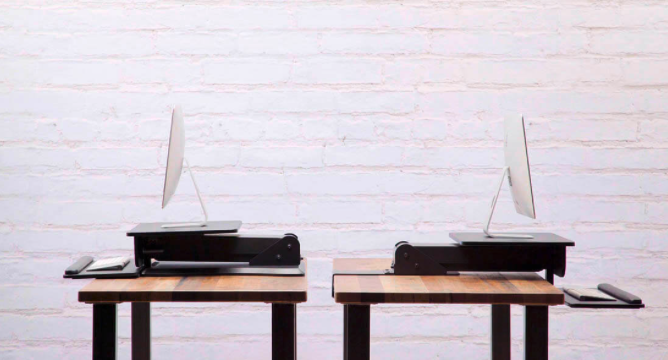 UPLIFT Adapt Height Adjustable Standing Desk Converter Takes You and Your Desk to New Heights