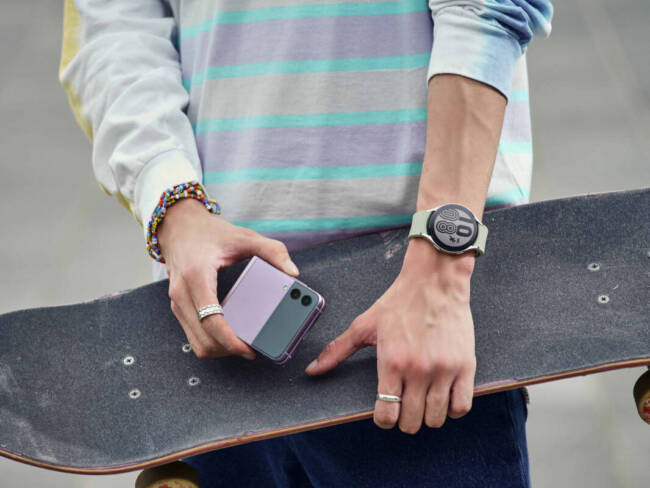 A skater with a lavender Samsung Galaxy Z Flip3; not gonna lie — it's pretty cute