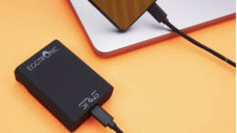 The Eggtronic Sirius 65W Universal Charger charging a phone