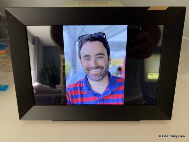 Nixplay Smart Photo Frame 10.1 inch Touch showing a photo of the author. 