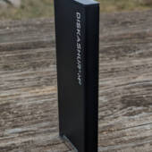 Sideview of iStorage diskAshur M2 in protective sleeve.