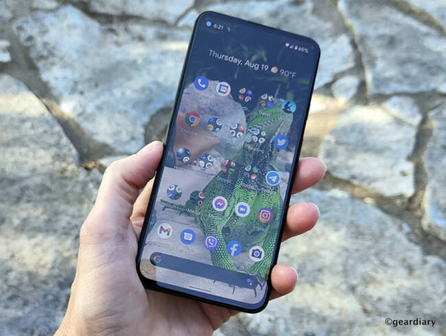 The Google Pixel 5a in hand.