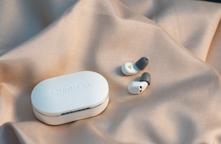 QuietOn 3 sleep earbuds next to case.