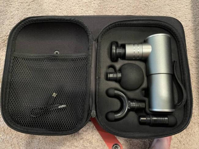 The Sportneer Mini 2 with its accessory kit and travel/storage case.