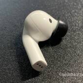 Side of the Olive Pro Audio Enhancing Earbuds.
