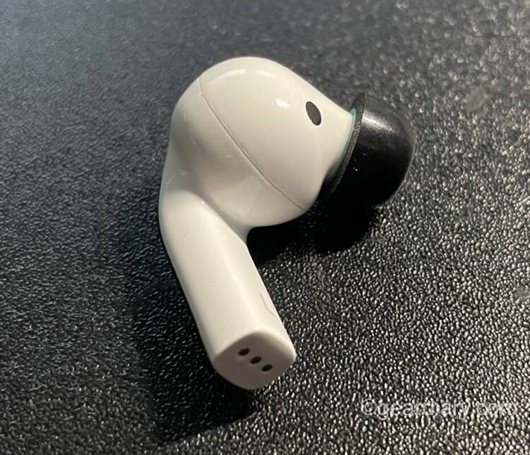 Side of the Olive Pro Audio Enhancing Earbuds.