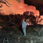 Lots of impressive smoke during the burn; here's a shot with the firebug/brush controller, my husband Kev.