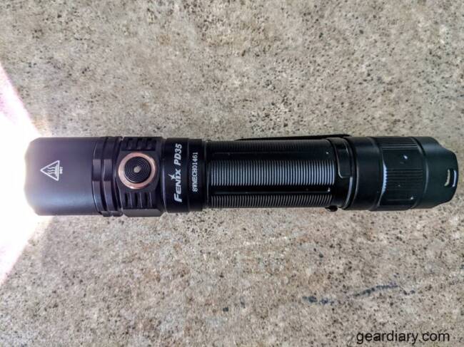 Fenix PD35 V3.0 Tactical Flashlight turned on.