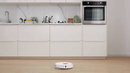 Roborock Black Friday Deals on the S7 shown cleaning a kitchen floor