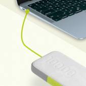 InfinityLab InstantGo 10000 Wireless Power Bank charging a laptop