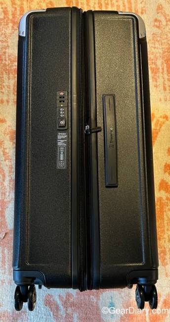 The TSA lock and zipper on the TravelPro Platinum Elite Large Check-In Expandable Hardside Spinner