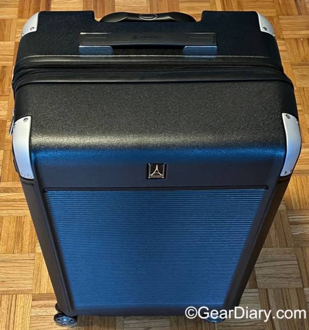 The front and top of the TravelPro Platinum Elite Large Check-In Expandable Hardside Spinner