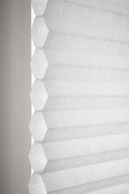 A closeup of one of the Lutron Serena Smart Architectural Honeycomb Shades fabric options