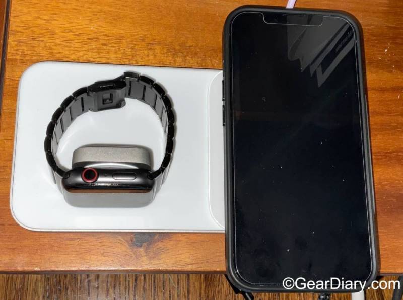 The author's Apple Watch and iPhone charging on the Nomad Base One Max