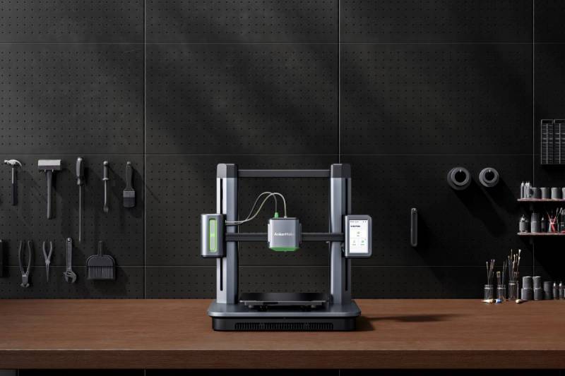 The Anker Make M5 3D Printer on a workbench