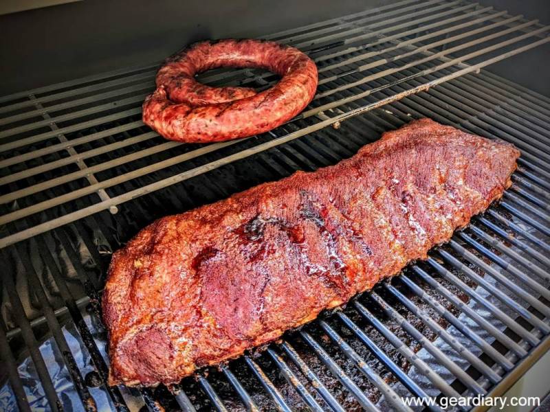 Sausage and ribs cooked on the BBQGuys Victory Pellet Grill