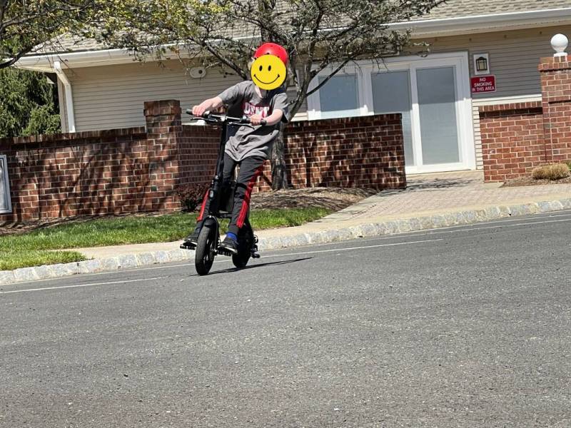 The author's son riding the Swagtron Swagcycle Pro
