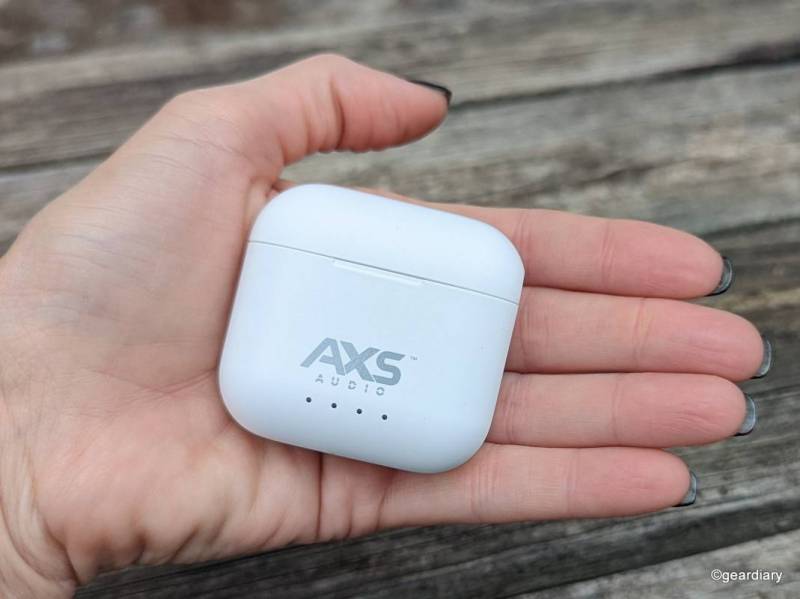 The AXS Audio Professional Earbuds charging case in the reviewer's hand