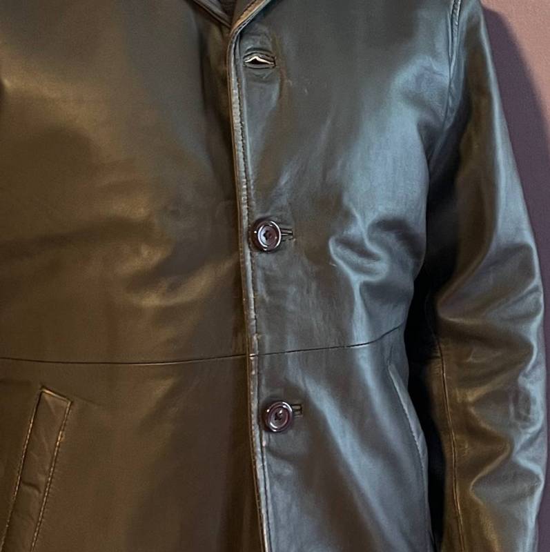 Closeup of the leather used in the Angel Jackets Distressed Dark Brown Mens Leather Car Coat