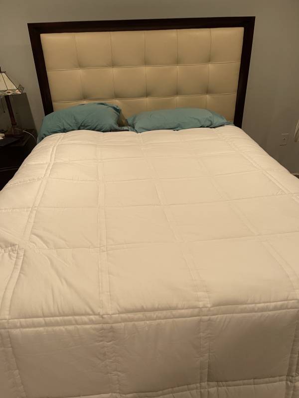 The Eli & Elm Weighted Comforter on the author's bed.