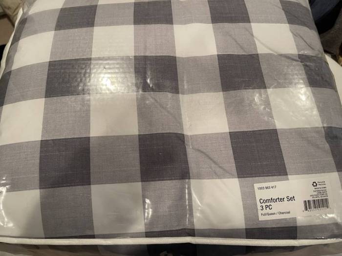 Retail packaging for the Tatefield Stone Gray Comforter