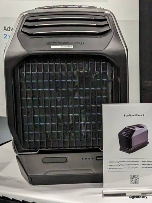 Photo of the EcoFlow Wave 2 sitting on a table with a product card next to it; photo was taken at CES 2023