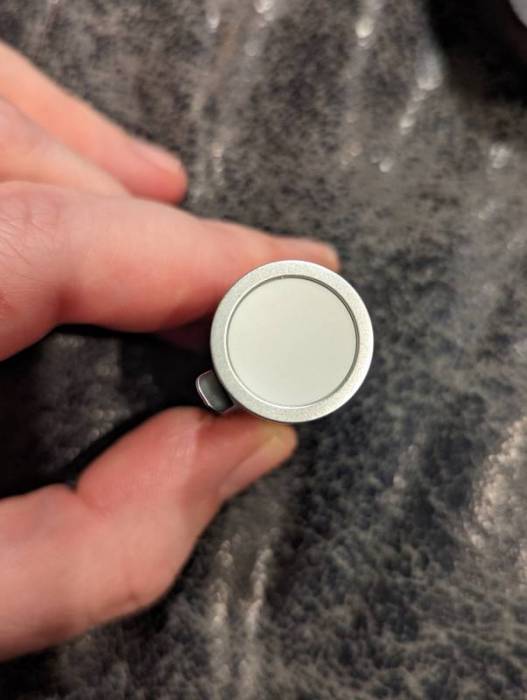 The button on the bottom of the Arlo Safe.