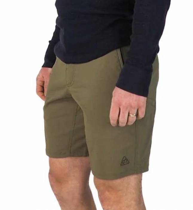 Man wearing a pair of army green LIVSN Ecotrek Trail Shorts