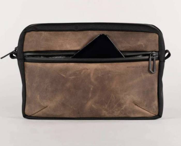 The WaterField Mason EDC Pouch with an iPhone in the front zippered pocket