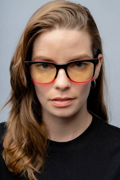A woman wearing a pair of GUNNAR Optiks Diablo 4 Lilith Collector’s Edition Gaming Glasses