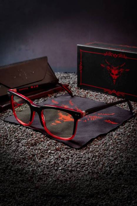 The Diablo 4 Lilith Collector’s Edition Gaming Glasses shown with included accessories