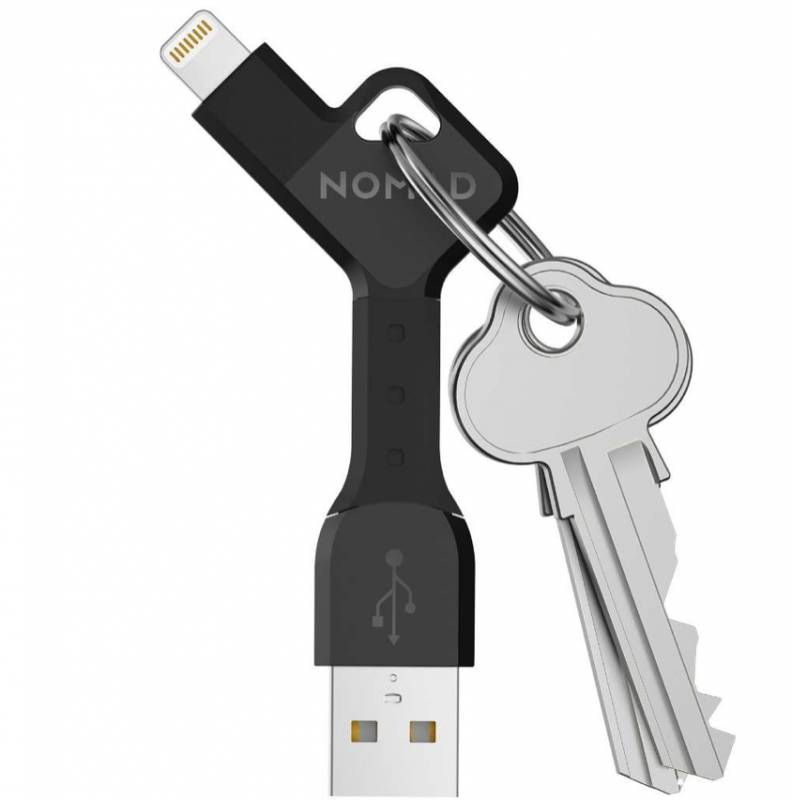 The original Nomad ChargeKey has a USB Type-A on one end and a Lightning charger on the other. It is shown holding a pair of keys and attached to a keyring.