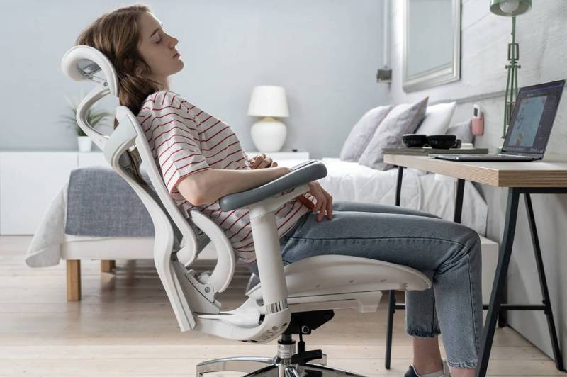 woman leaning back in a SIHOO Doro-C300 Ergonomic Office Chair