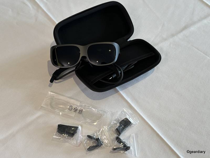 Lenovo Legion Glasses in their carry case with included accessories