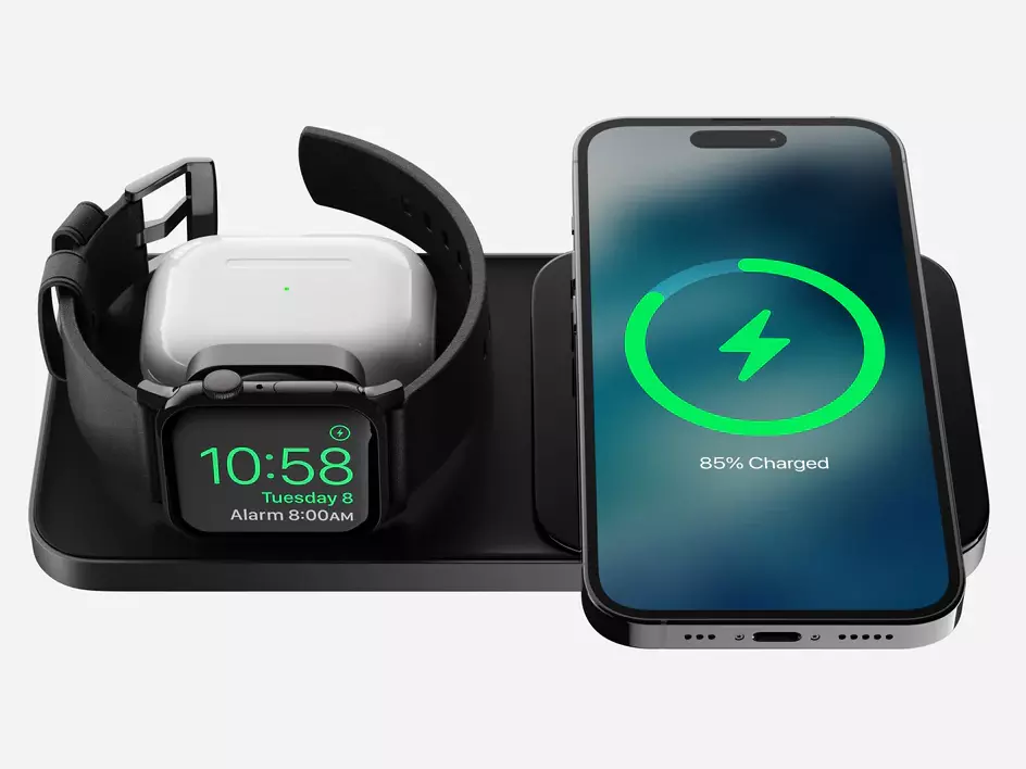 Front view of the Nomad Base One Max 3-in-1 MagSafe Charger in Carbide & Black with iPhone, Apple Watch, and AirPods being charged simultaneously