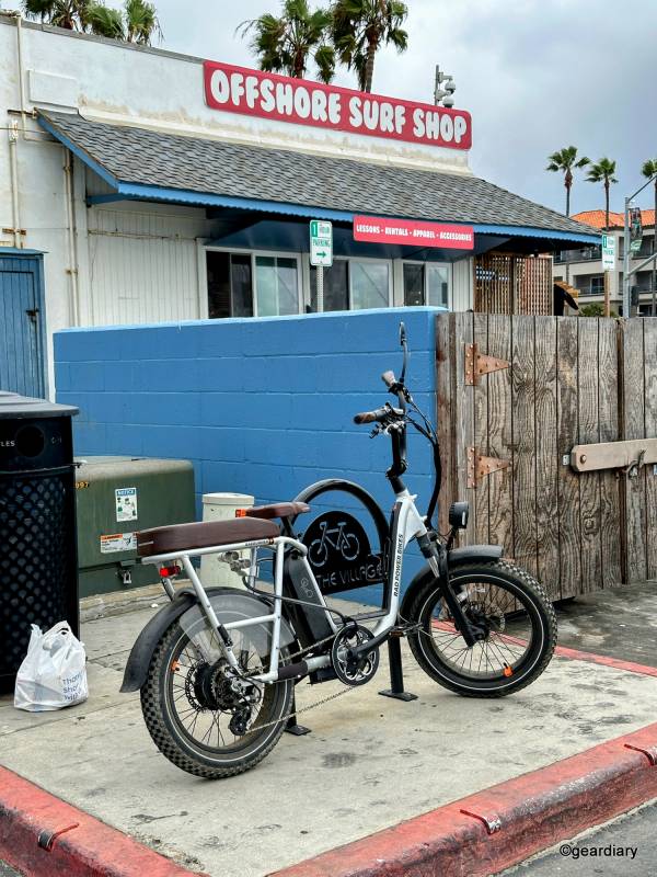 A Rad Power Bikes RadRunner Plus bike photographed by the Offshore Surf Shop in Carlsbad, CA.