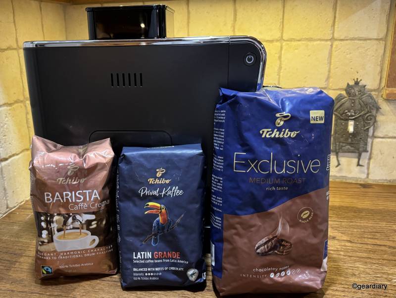 Tchibo Bean-to-Brew Coffee Machine with three bags of coffee