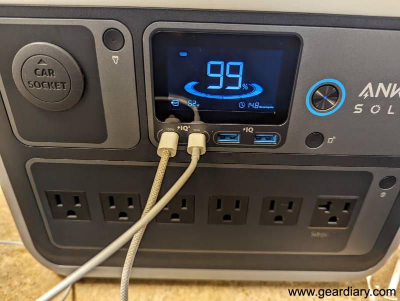 Two USB-C cables plugged into their ports on the Anker SOLIX C1000 Portable Power Station