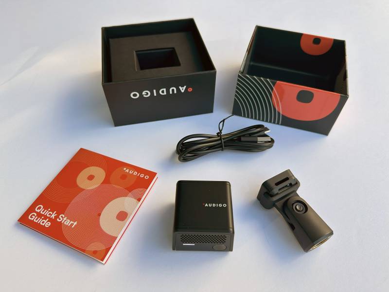 Contents of the Audigo wireless microphone's retail packaging
