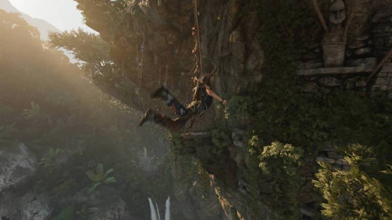 Lara Croft attempting a jump in Shadow of the Tomb Raider