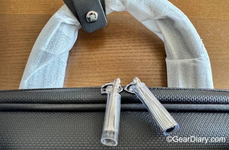 Protective wrapping on the xBriefcase handles and zipper pulls