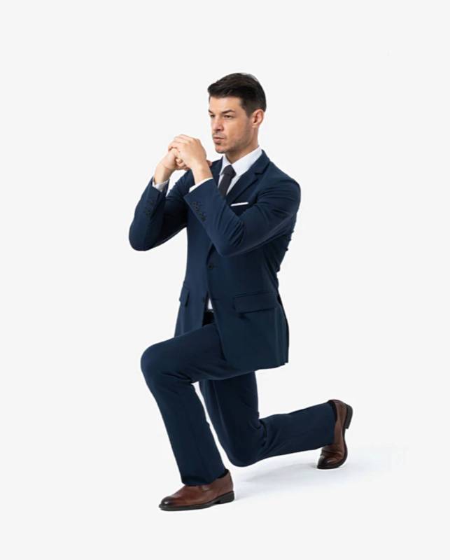 Man kneeling while wearing an xSuit 4.0