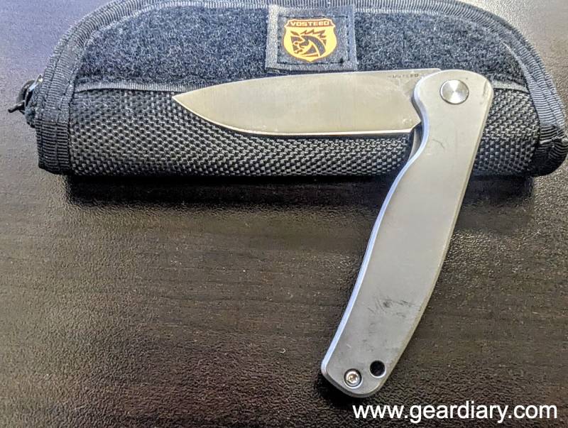 The Vosteed Mini Labrador Lock Knife half opened, showing the blade. 