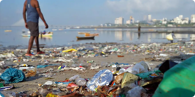 Photo of plastic trash on a beach.