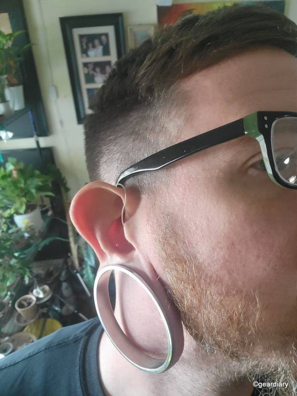 The author wearing the Elehear Alpha Pro, showing the front view