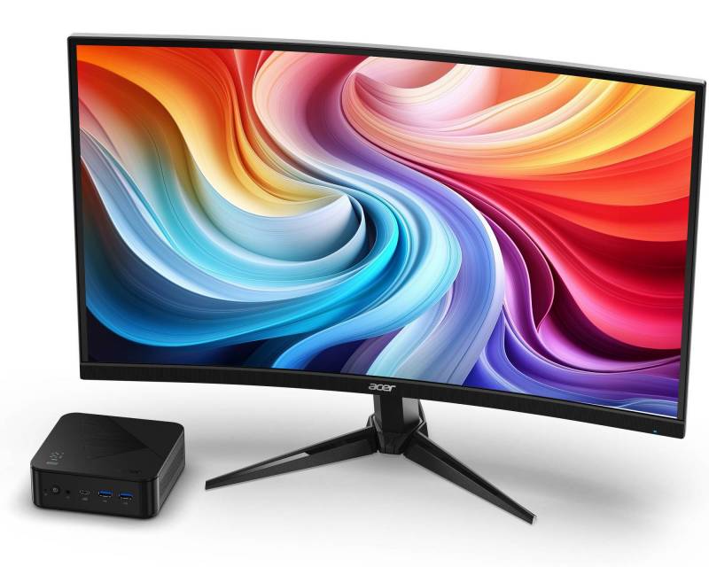 Acer Revo Box AI next to a monitor
