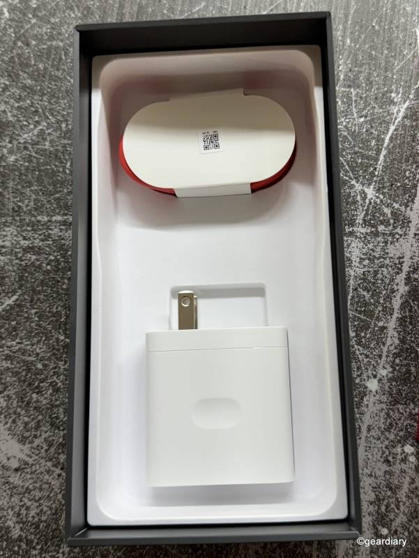 Accessories included with the OnePlus 13