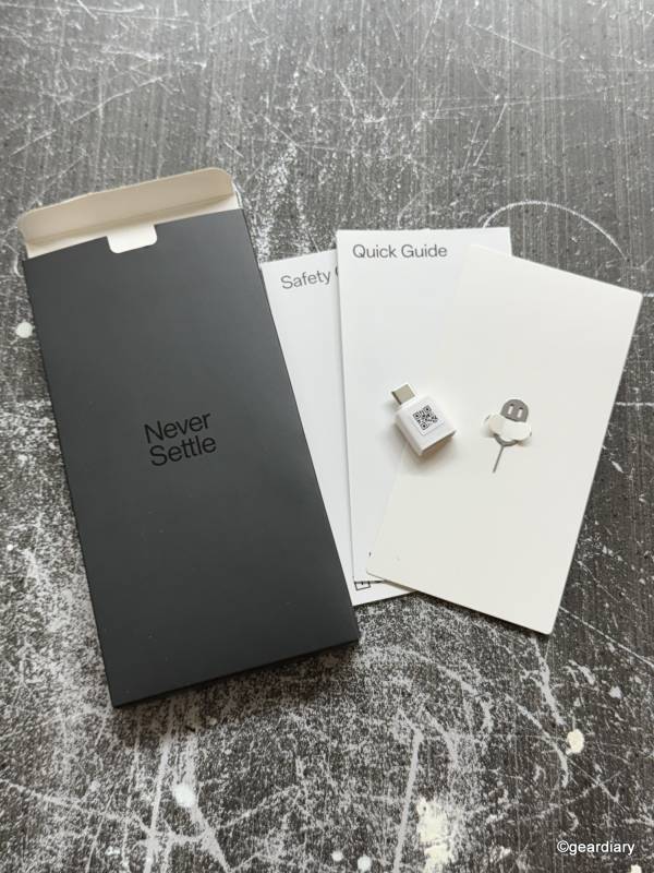 Accessories included with the OnePlus 13